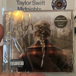 Signed Evermore CD by Taylor Swift! Never opened!